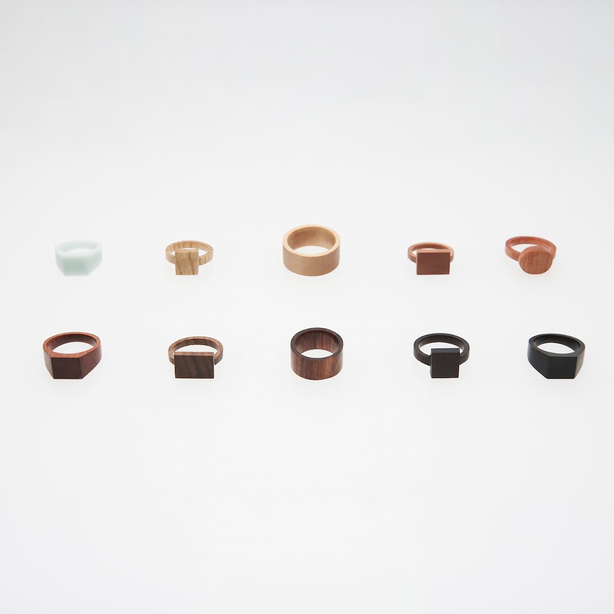 RAW rings | wood & Corian | lineup of ten rings in assorted materials